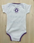 Organic baby onesie in white with purple accents and animal design