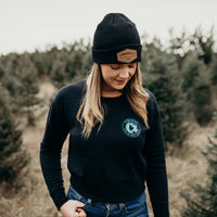 Women's sustainably made black cropped hoodie with brand logo