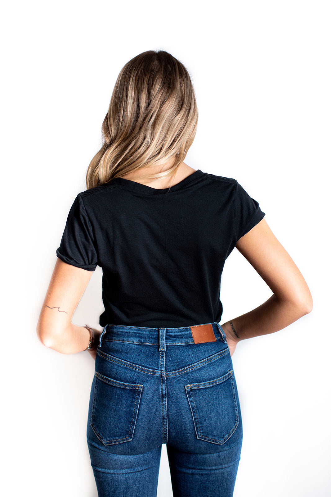 Women's ethically made short sleeve black t-shirt with small Ungalli logo