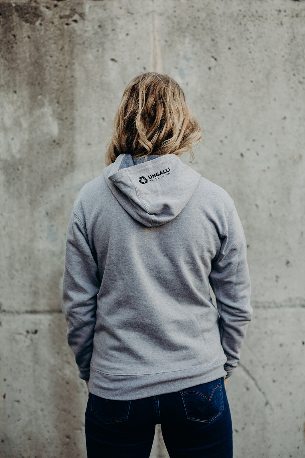 Grey unisex pull over hoodie with black Sleeping Giant design