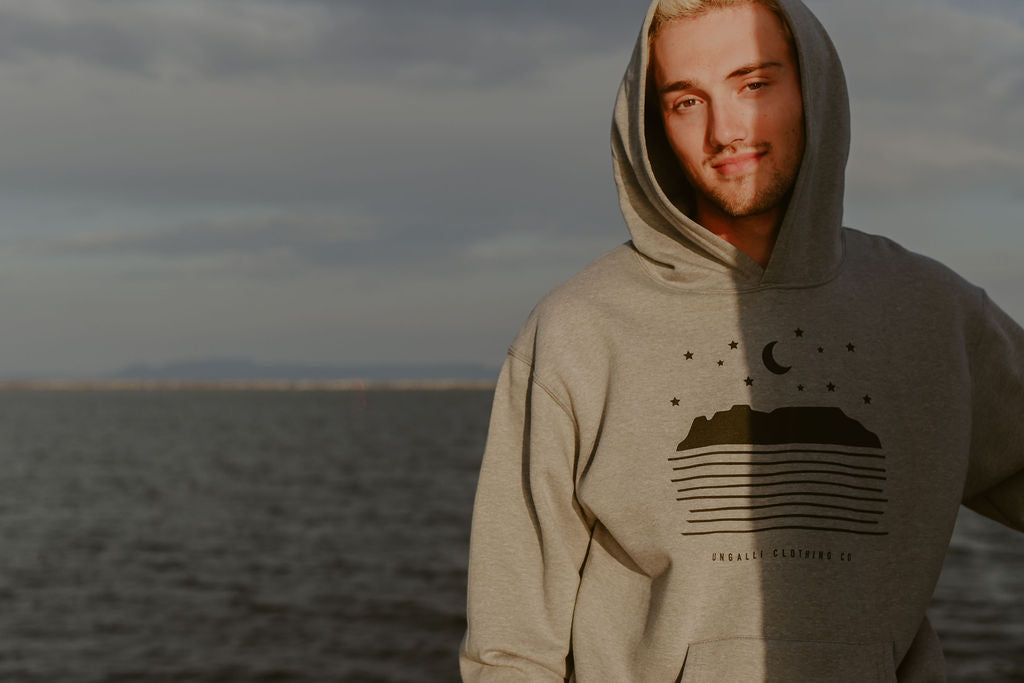 Grey unisex pull over hoodie with black Sleeping Giant design