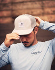 Unisex recycled snap back hat in grey or black with white Ungalli logo on front