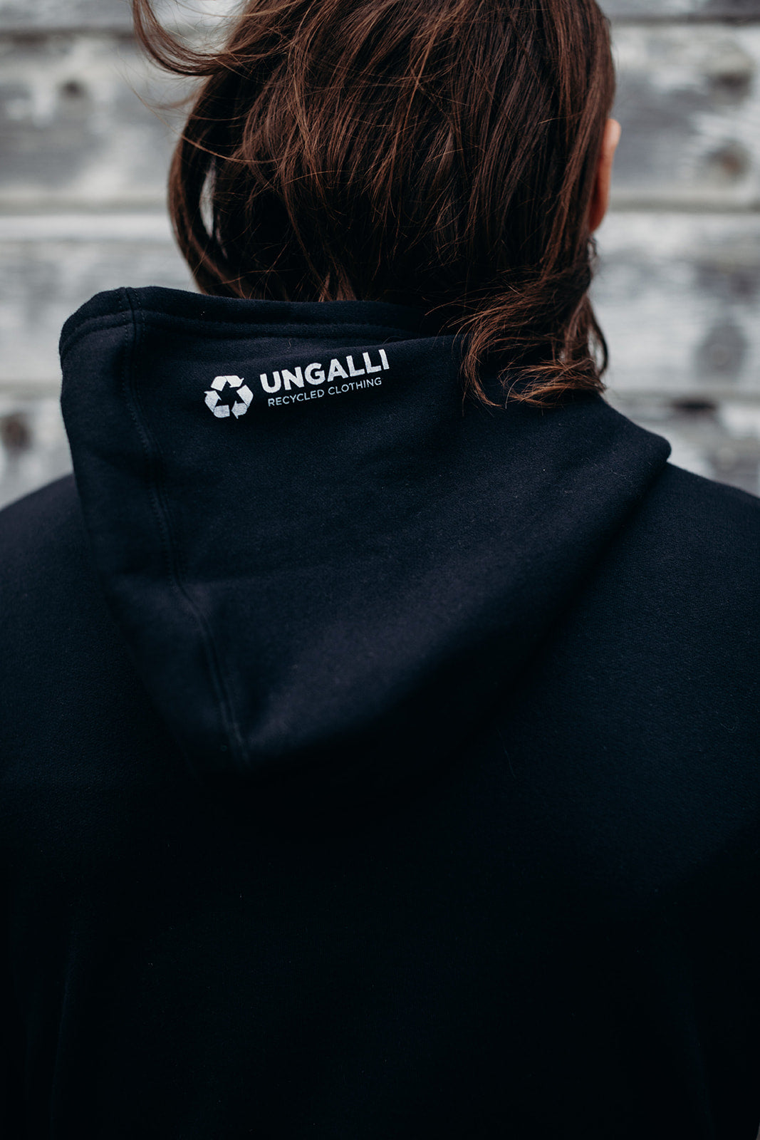 Black organic unisex hoodie with white 'Port Arthur' logo