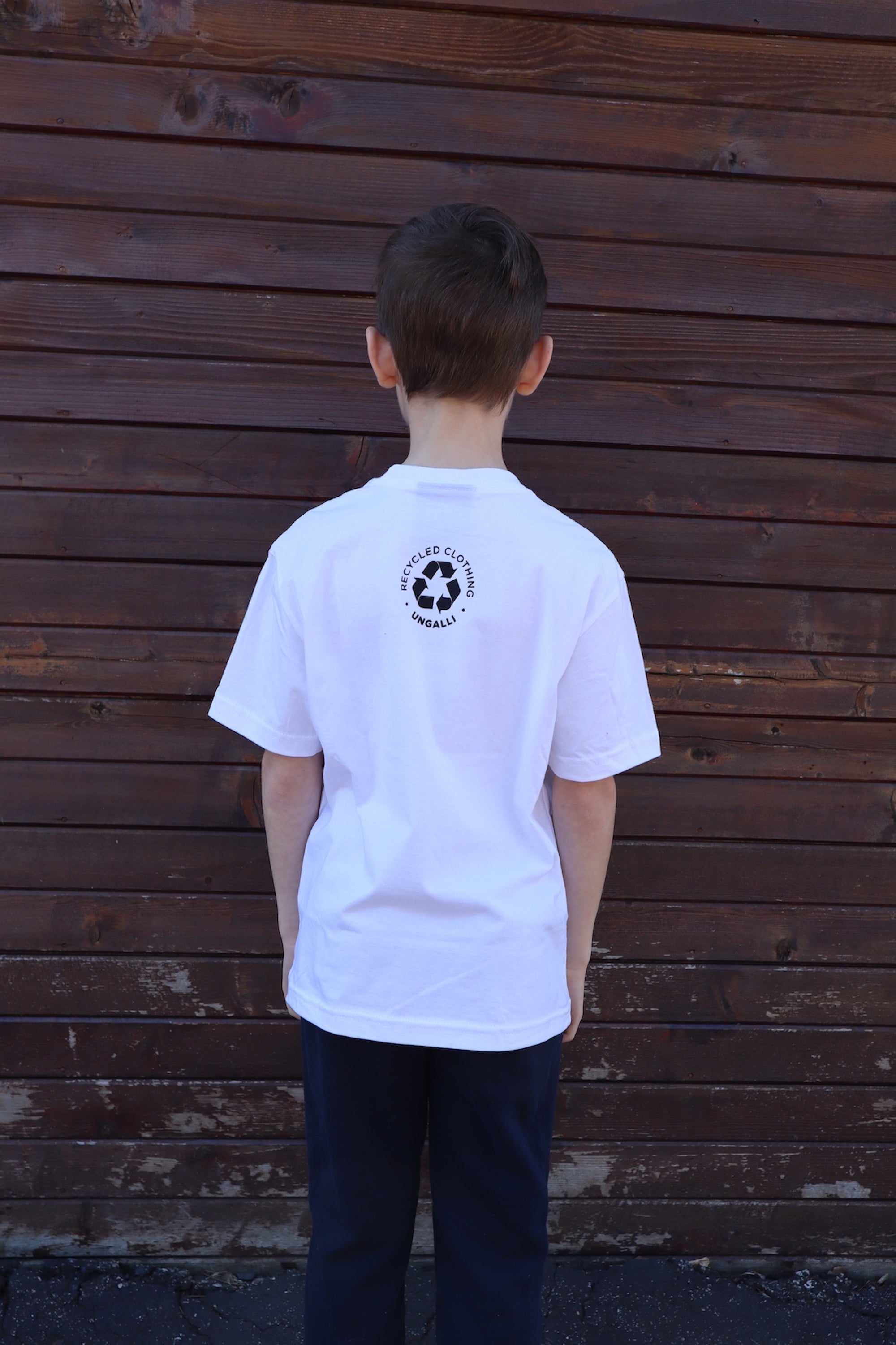 Children's sustainably made white t-shirt with earth design and text on front