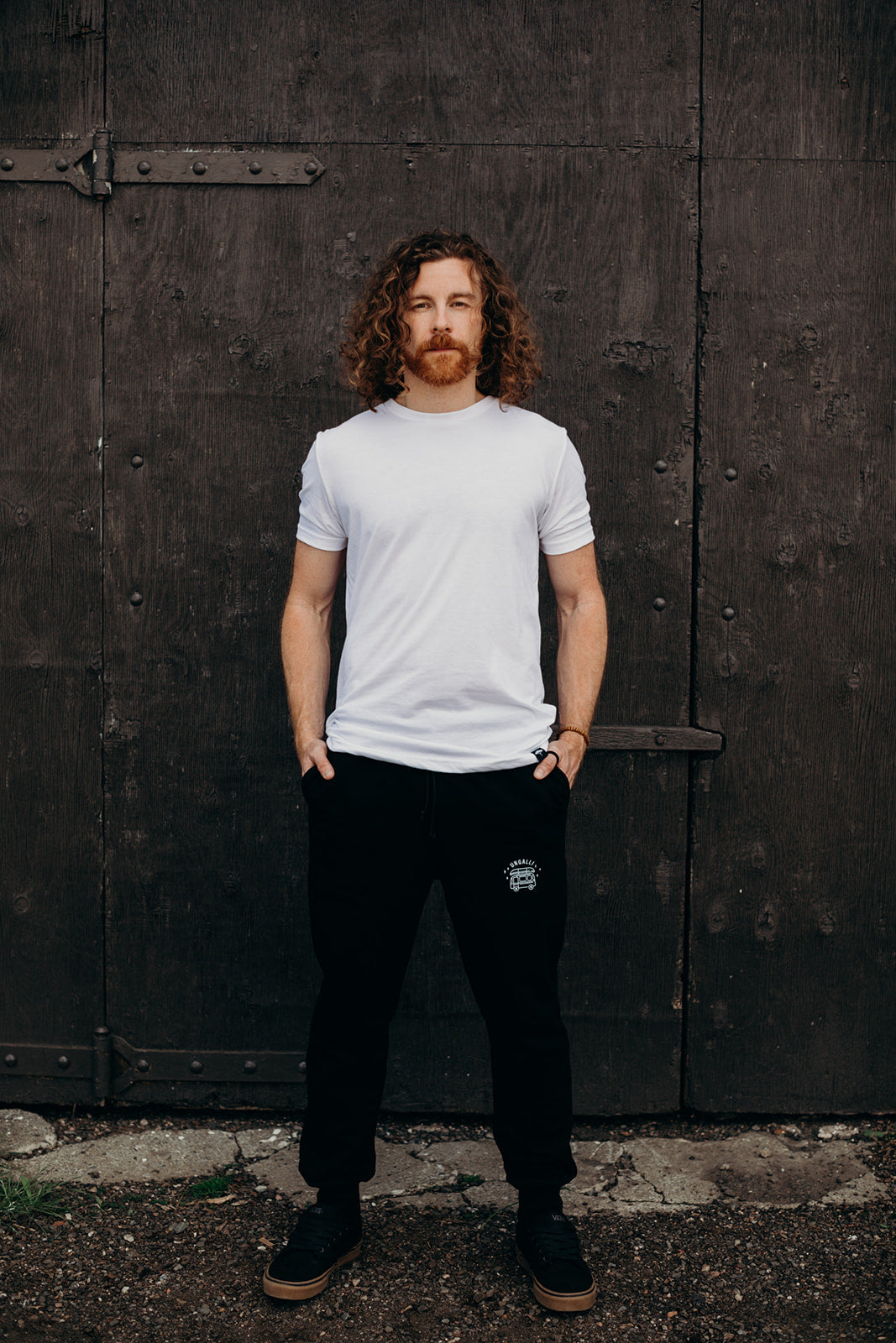 Black ethically made unisex joggers with white detailing