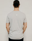 Ethically made grey short sleeved 'In Our Hands' unisex pocket t-shirt with Earth logo