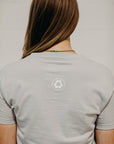 Ethically made grey short sleeved 'In Our Hands' unisex pocket t-shirt with Earth logo