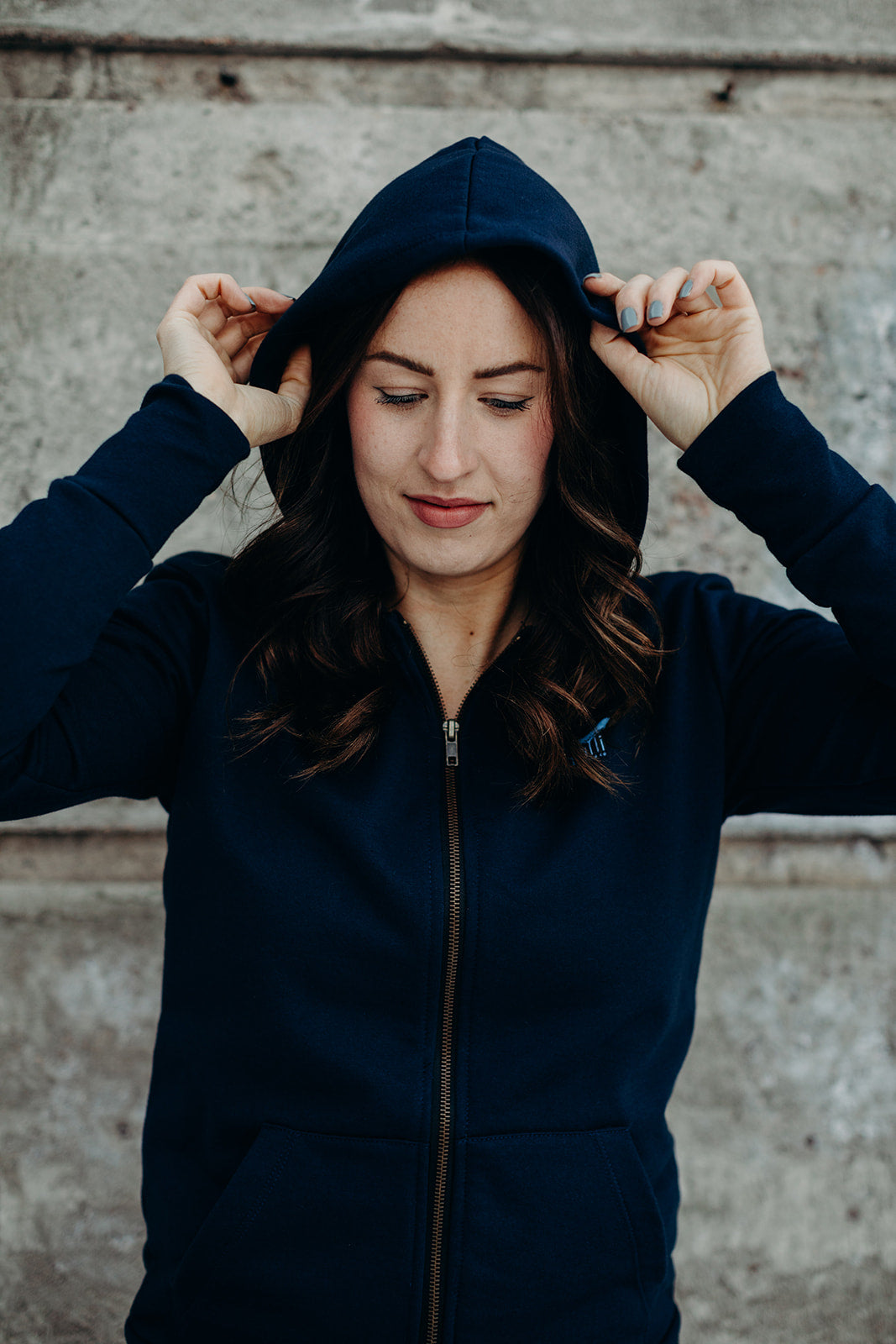 Recycled unisex navy zip up hoodie with light blue Ungalli logo