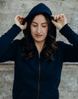 Recycled unisex navy zip up hoodie with light blue Ungalli logo