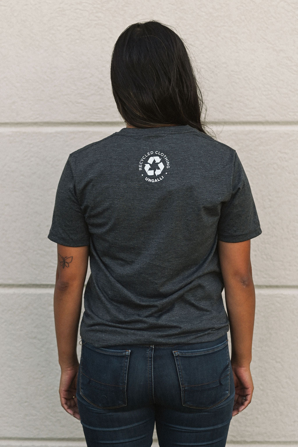 Recycled grey short sleeve unisex t-shirt with text on front that reads: "human change climate change"