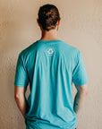 Unisex ethically made short sleeve teal t-shirt with white Ungalli logo on front