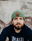 Unisex organic toque in black, green or grey with brown sleeping giant patch