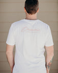 Organic white unisex t-shirt with multi-coloured dreamin' plane logo on front