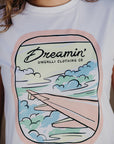 Organic white unisex t-shirt with multi-coloured dreamin' plane logo on front