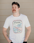Organic white unisex t-shirt with multi-coloured dreamin' plane logo on front