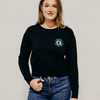 Women's sustainably made black cropped hoodie with brand logo