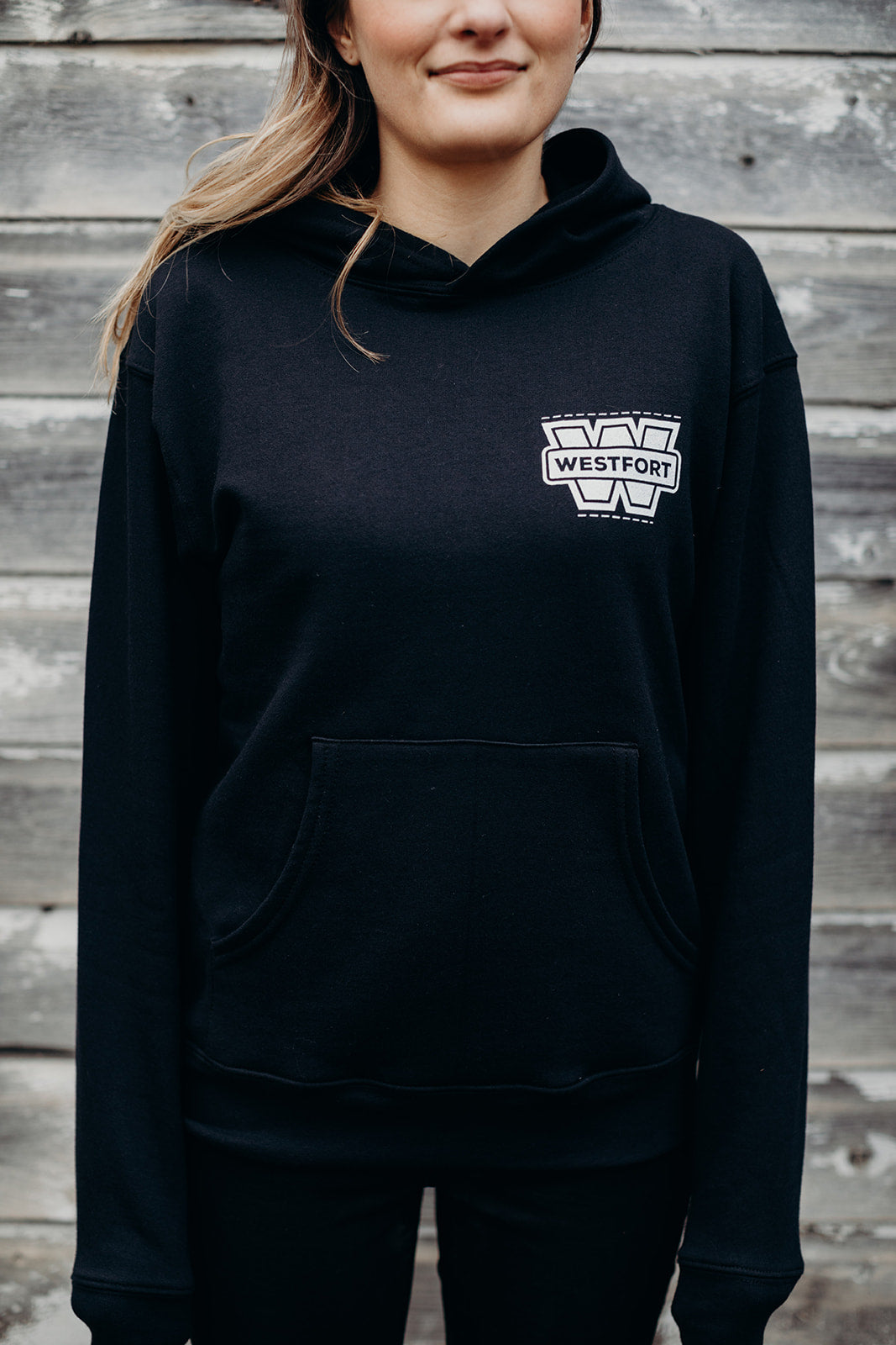 Unisex sustainably made black hoodie with white 'westfort' logo