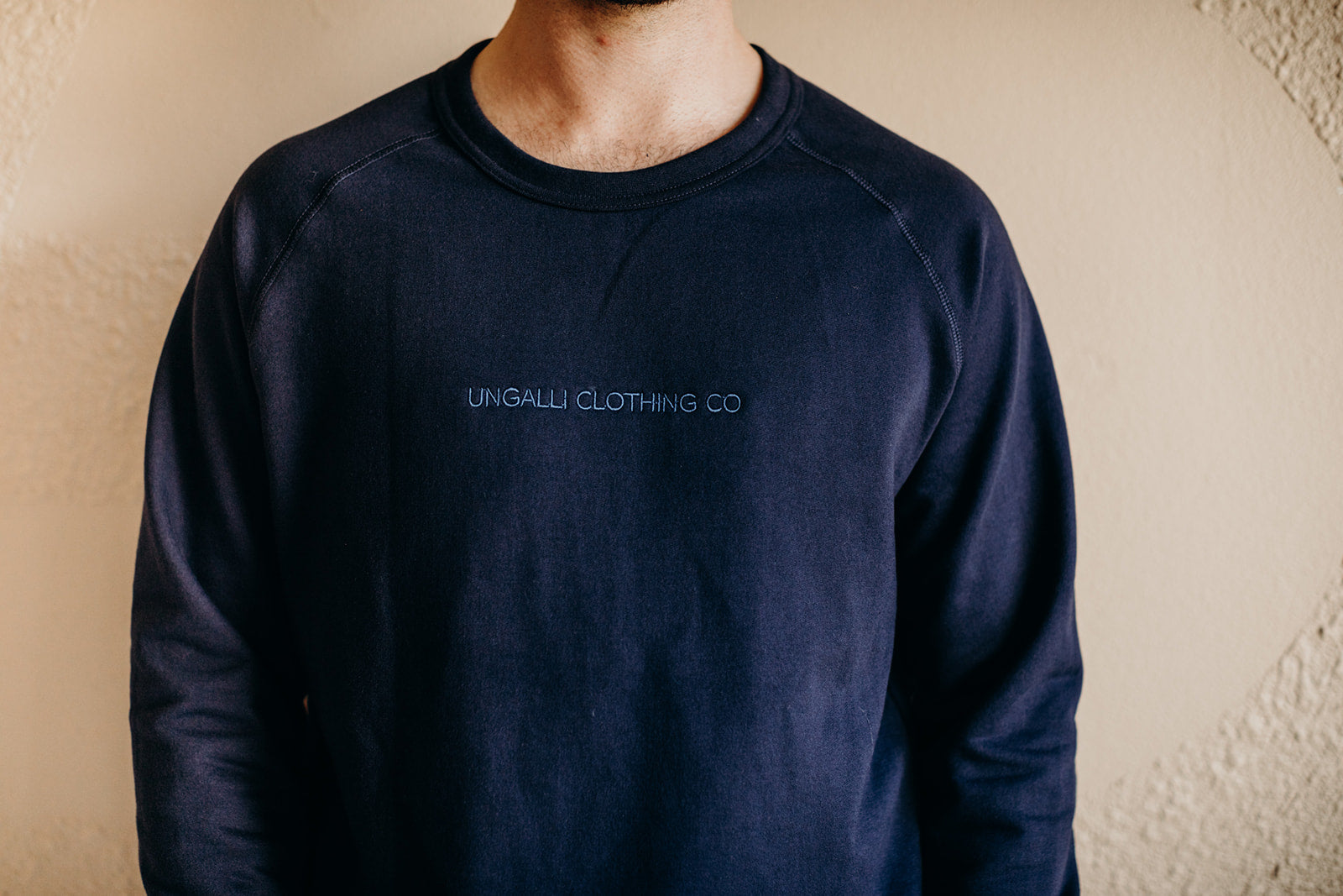 Organic unisex crew neck pullover hoodie in navy