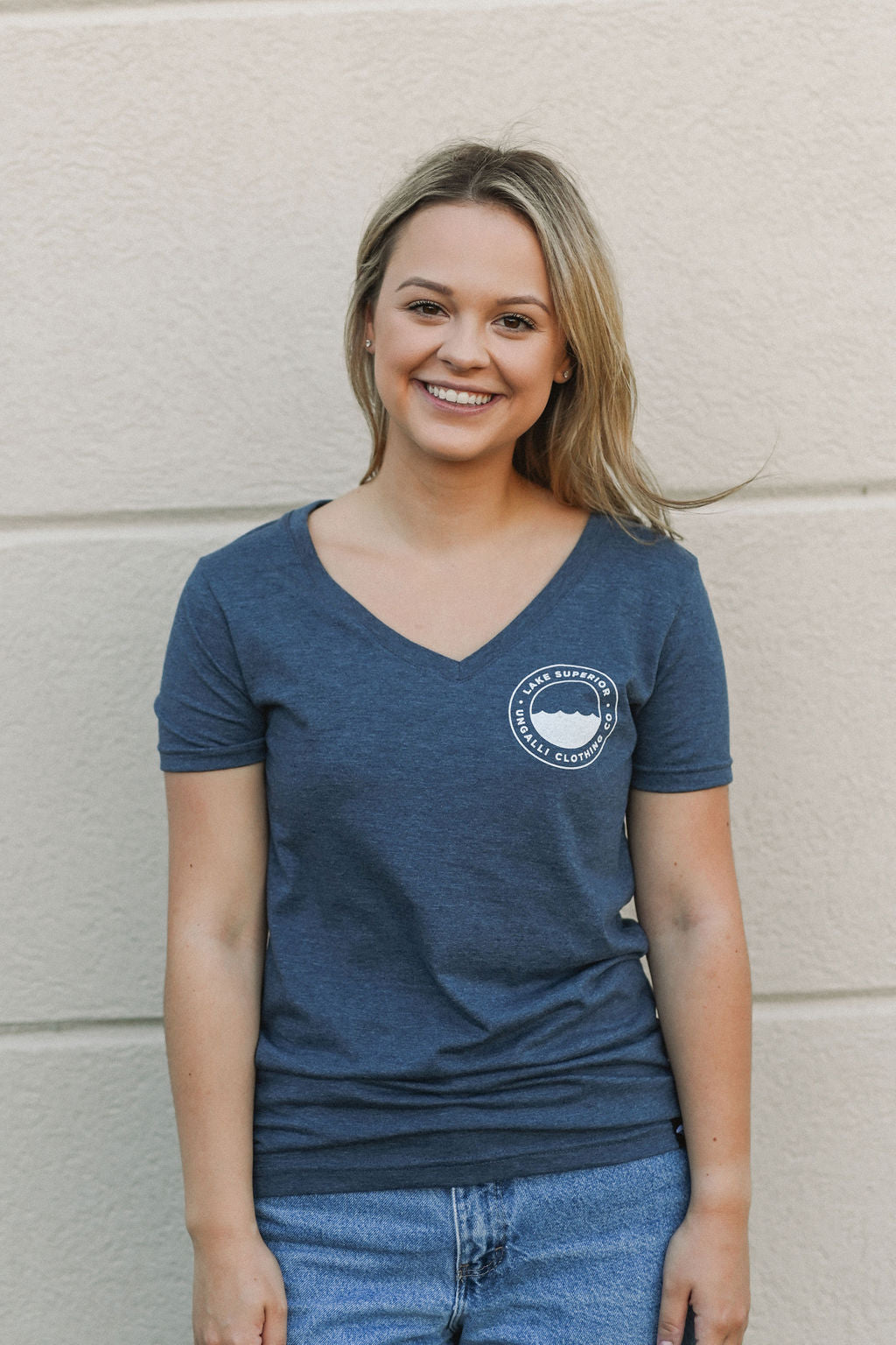 Women's blue recycled v neck t-shirt with white Lake Superior logo