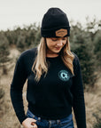 Women's sustainably made black cropped hoodie with brand logo