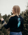 Women's sustainably made black cropped hoodie with brand logo