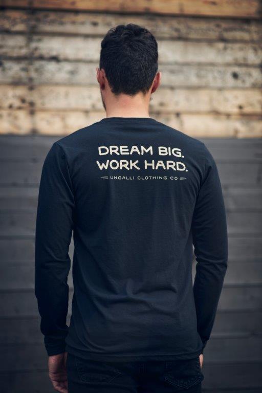 Black organic long sleeve unisex shirt with text that reads: "Dream big. Work hard." on the back