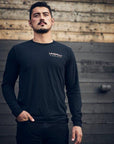 Black organic long sleeve unisex shirt with text that reads: "Dream big. Work hard." on the back