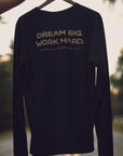 Black organic long sleeve unisex shirt with text that reads: "Dream big. Work hard." on the back