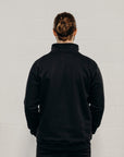 Unisex ethically made black 1/4 zip sweater with small white Ungalli tree on front