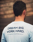 Ethically made unisex blue skies long sleeve shirt with text on back reading: "Dream big. Work hard."