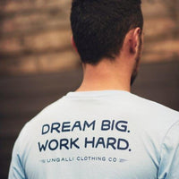 Ethically made unisex blue skies long sleeve shirt with text on back reading: "Dream big. Work hard."
