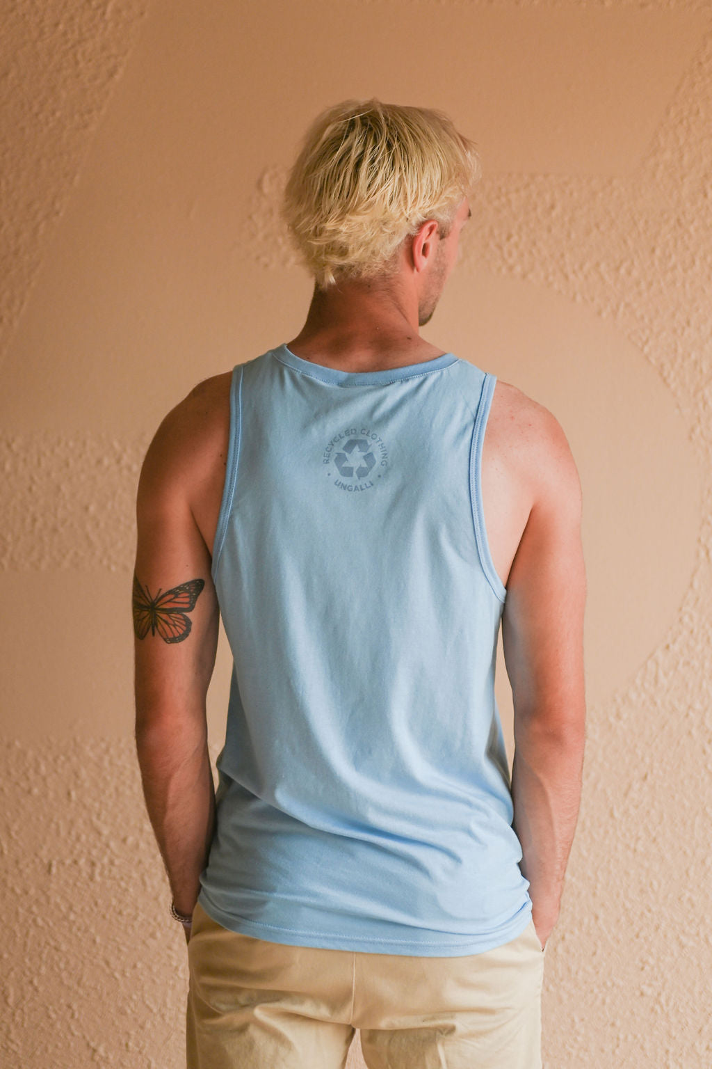 Light blue men's tank top with but Ungalli logo across front