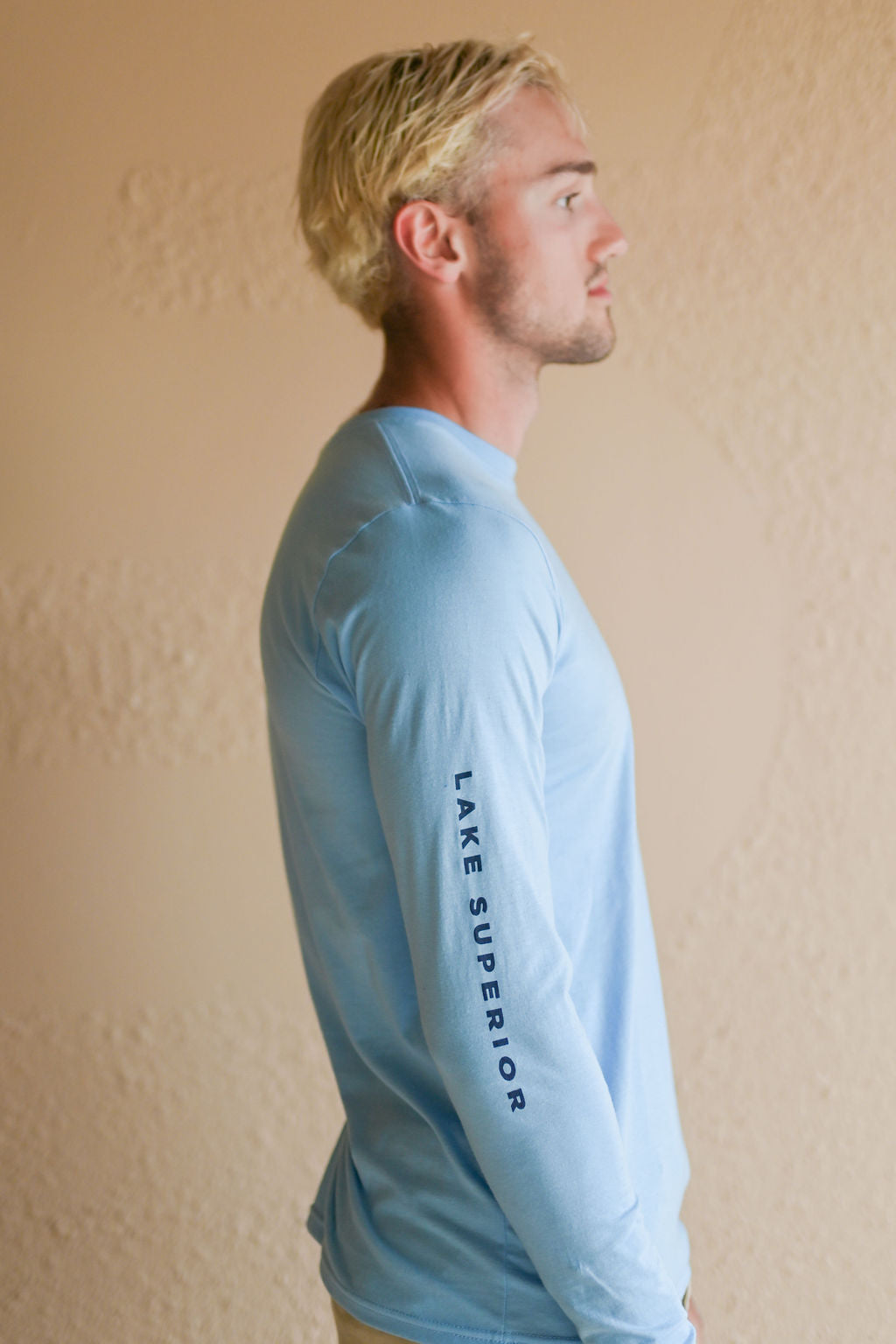 Unisex organic Lake Superior long sleeve light blue shirt with boat logo and text