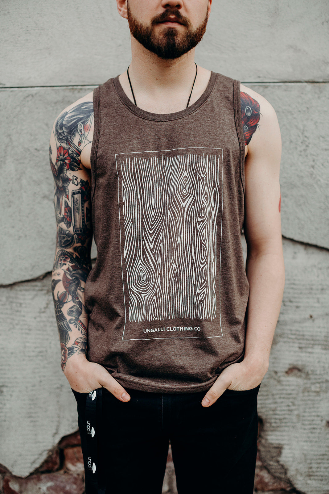 Ethically made mens brown tank top with white wood grain design on front