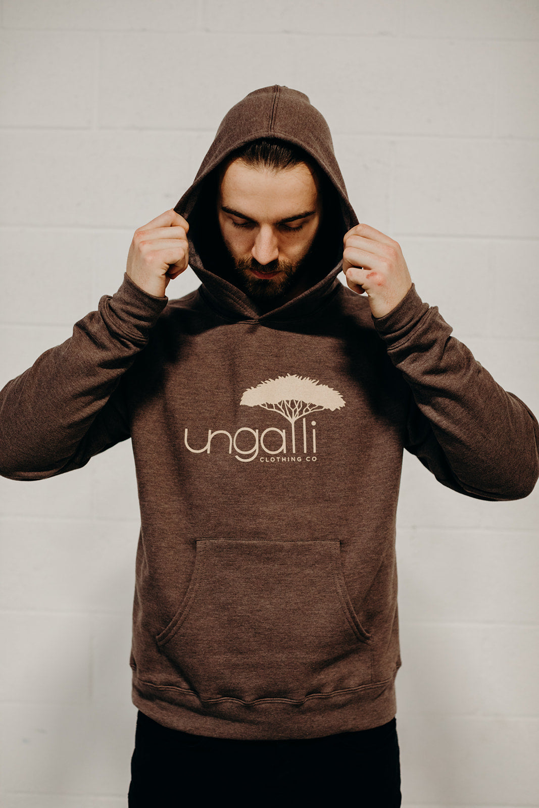 Brown ethically made unisex pull over hoodie with beige Ungalli logo