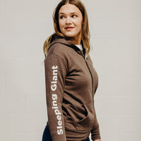 Brown organic unisex zip up hoodie with multi coloured  'Nanabijou' design and white text