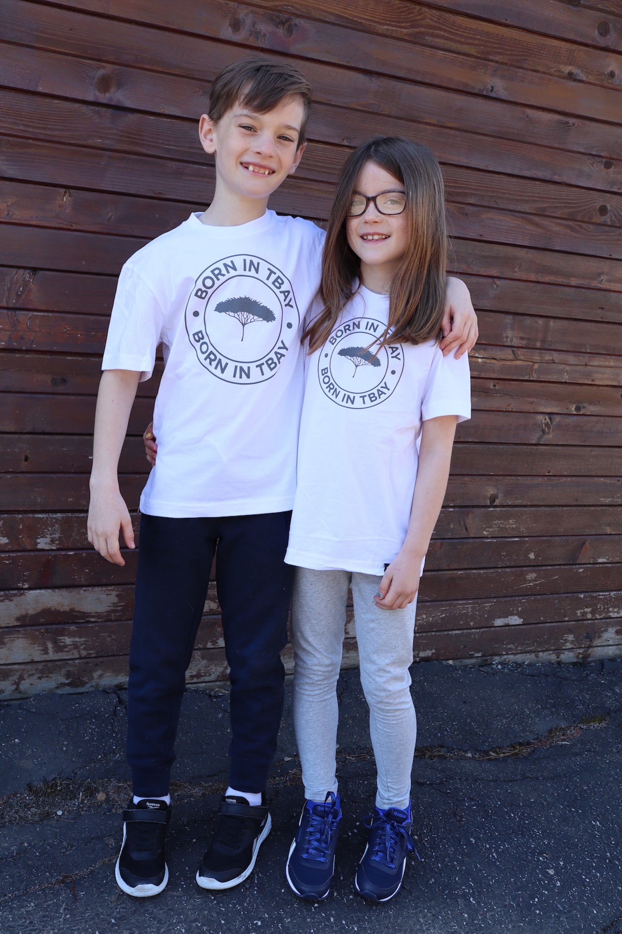 Kid's organic short sleeve white t-shirt with grey design on front