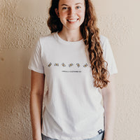 Women's white organically made t-shirt with bee design on front 