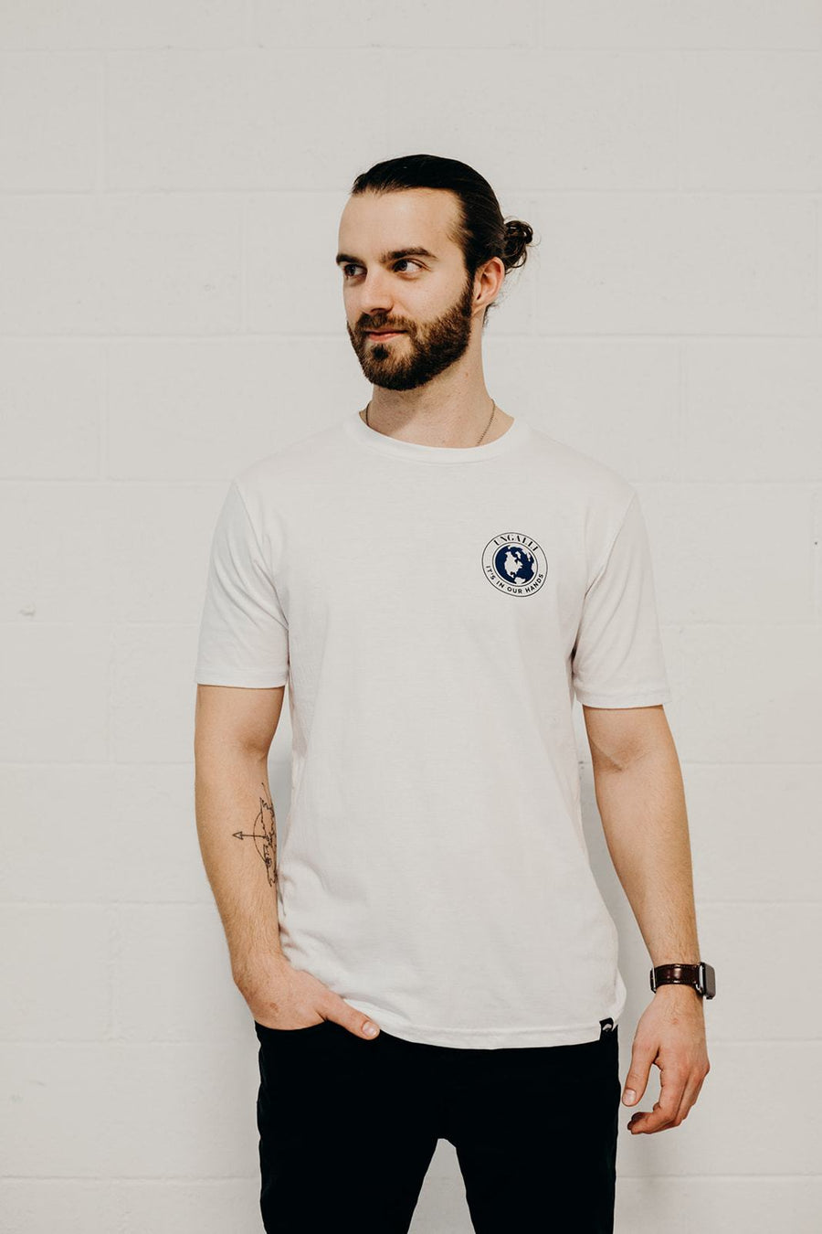 White organic short sleeve unisex t-shirt with blue "it's in our hands" Ungalli logo on front and across back