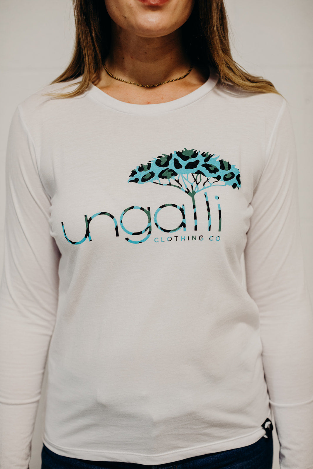 White long sleeve ethically made top with Ungalli logo