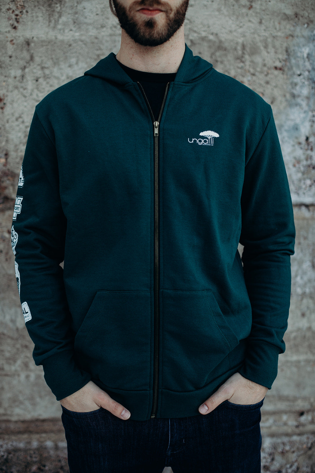 Organic green unisex zip up hoodie with white details