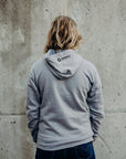 Grey unisex pull over hoodie with black Sleeping Giant design