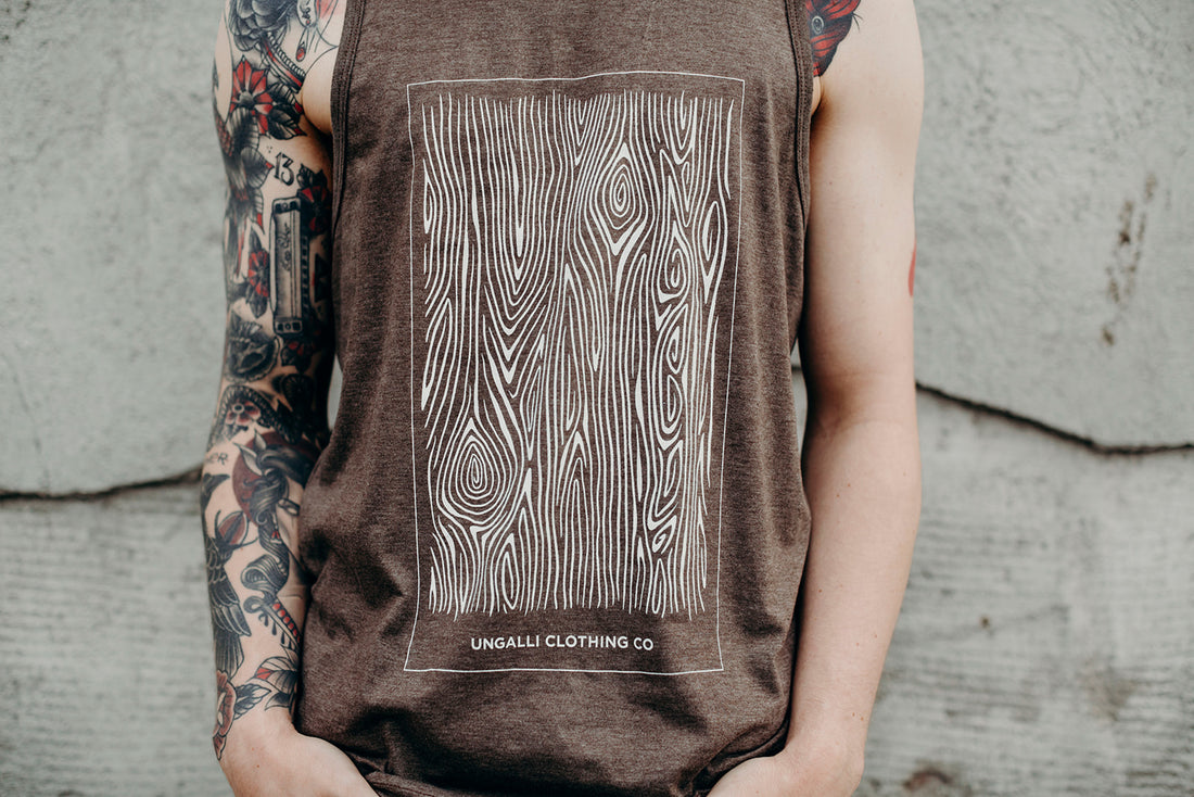 Ethically made mens brown tank top with white wood grain design on front