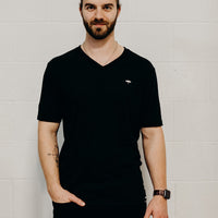 Men's ethically made short sleeve black v neck t-shirt with small white Ungalli tree on front