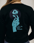 Women's sustainably made black cropped hoodie with brand logo