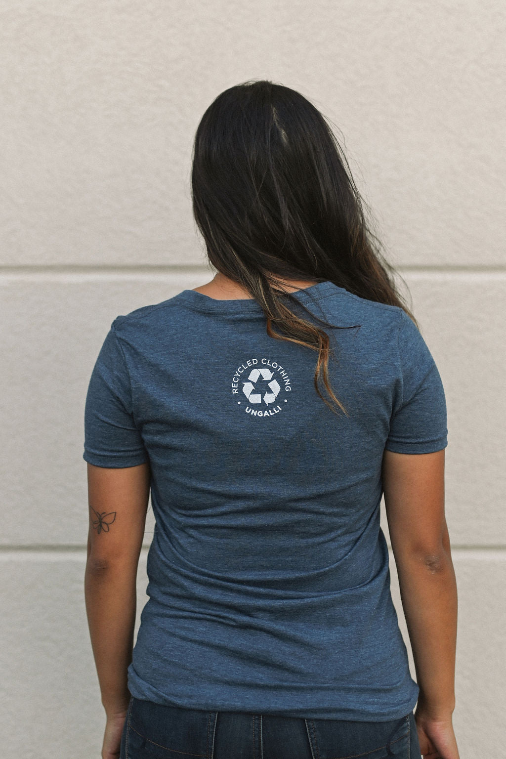 Organic blue short sleeve women&#39;s shirt with &#39;shelter&#39; logo