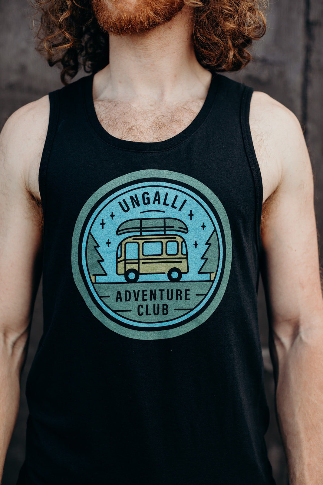Mens organic black tank top with adventure club multi coloured logo