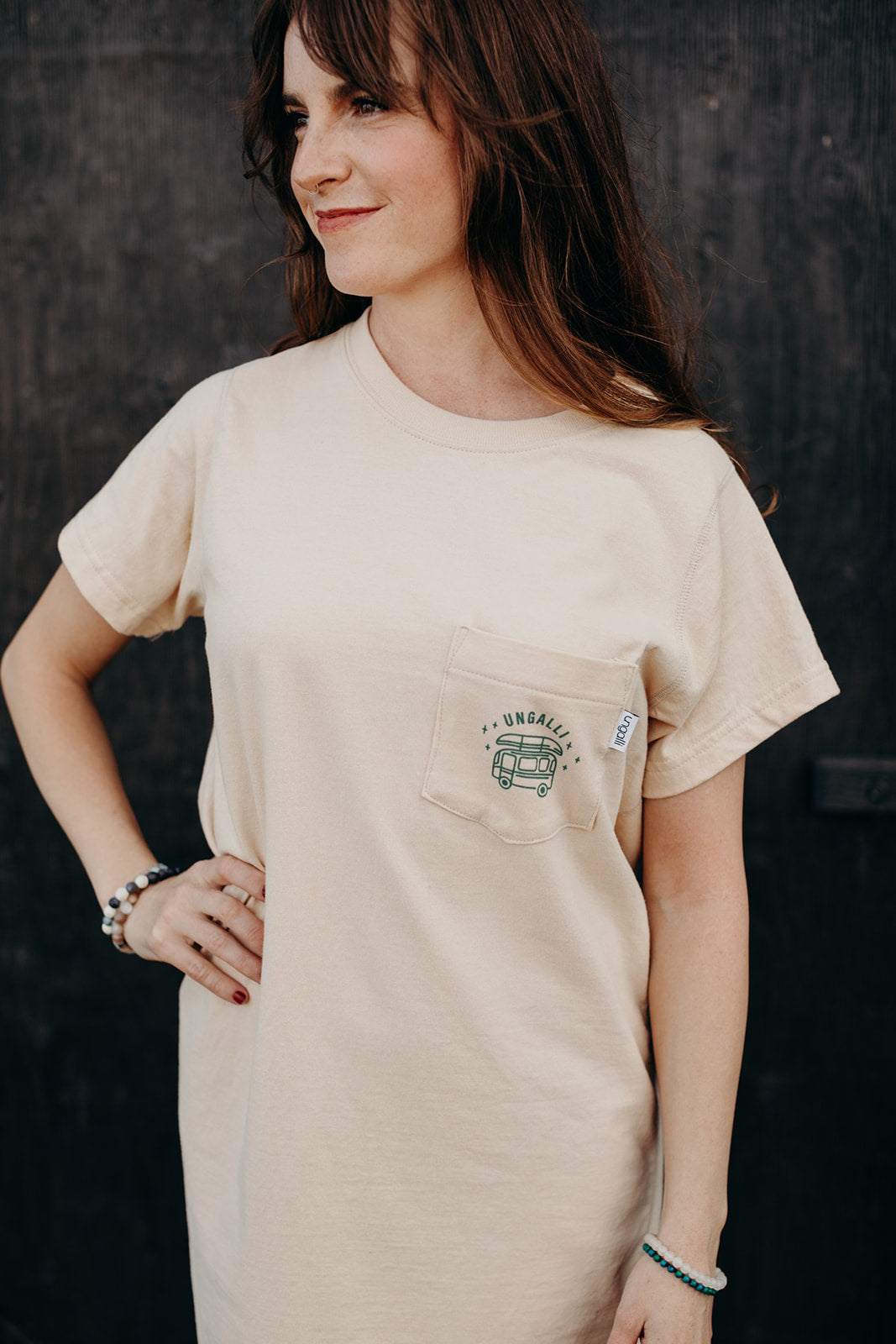 Organic beige t-shirt dress with green details