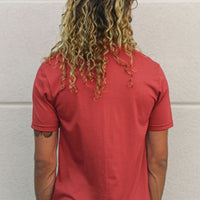 Unisex sustainably made red t-shirt with small white ungalli tree on front