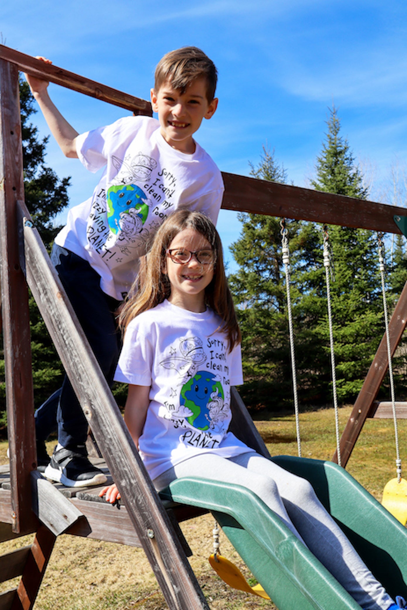 Children's sustainably made white t-shirt with earth design and text on front